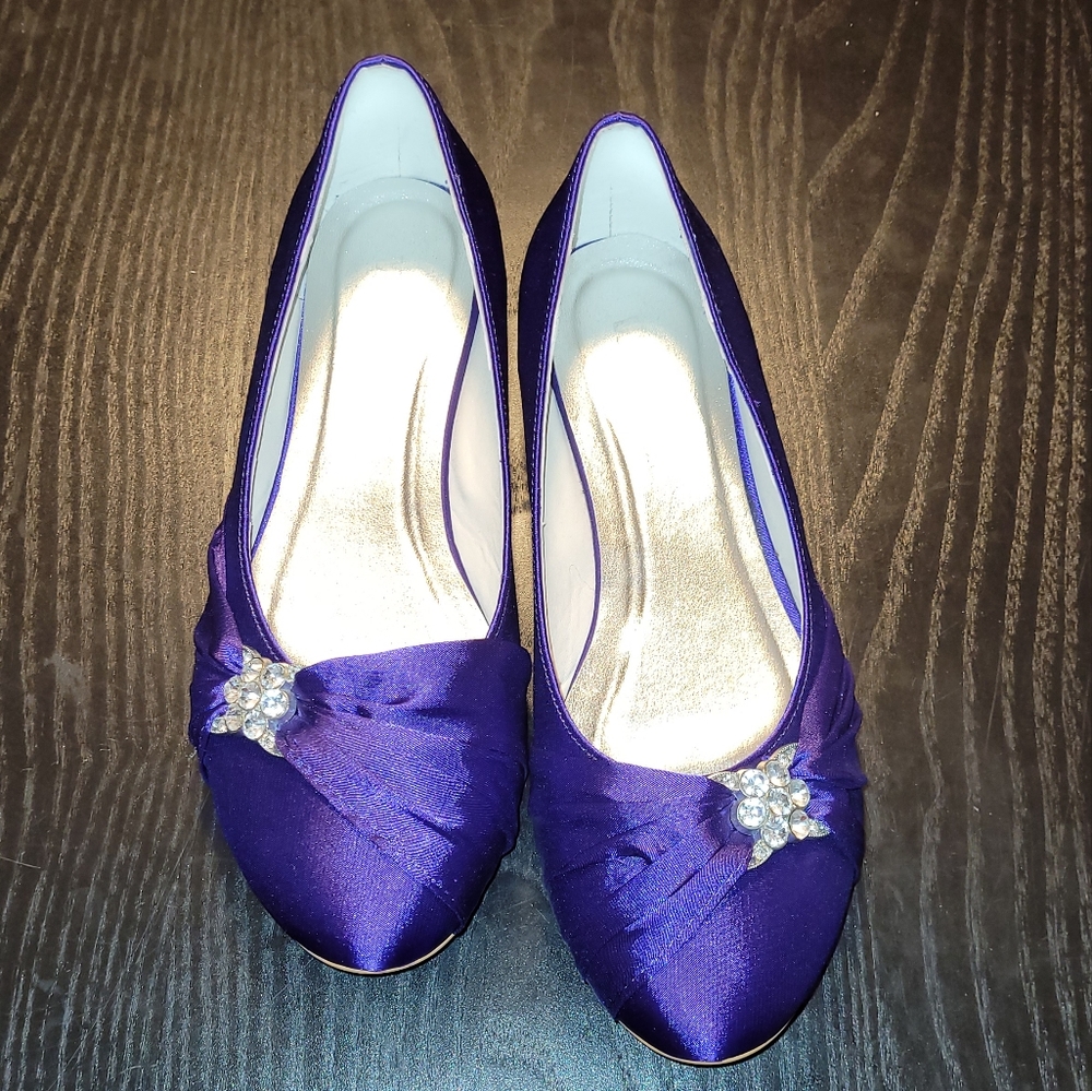 Purple flats with rhinestone accent size 9